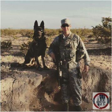 Military K9 poses with handler